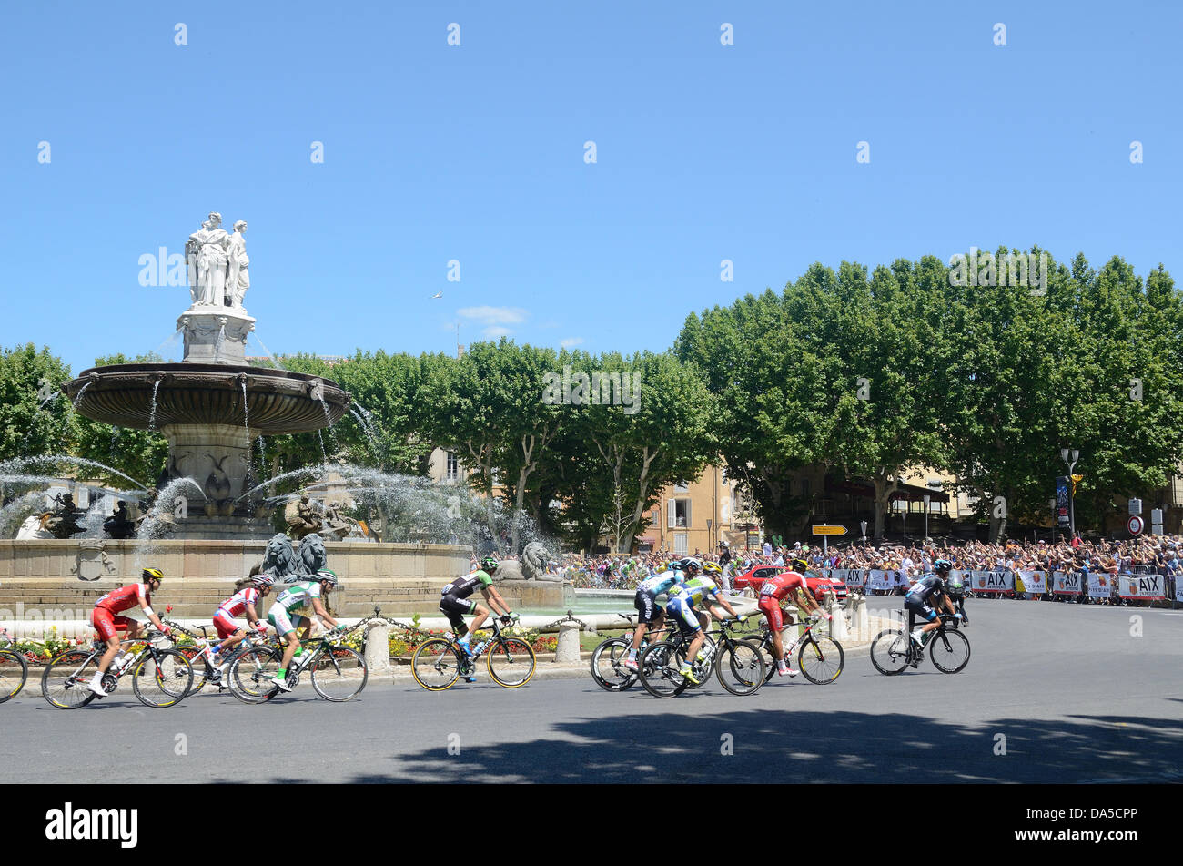 Cyclists Cycle Past the Rotonde Fountain at Aix-en-Provence During the Tour de France Bike Race Aix-en-Provence Credit:  Chris Hellier/Alamy Live News Stock Photo
