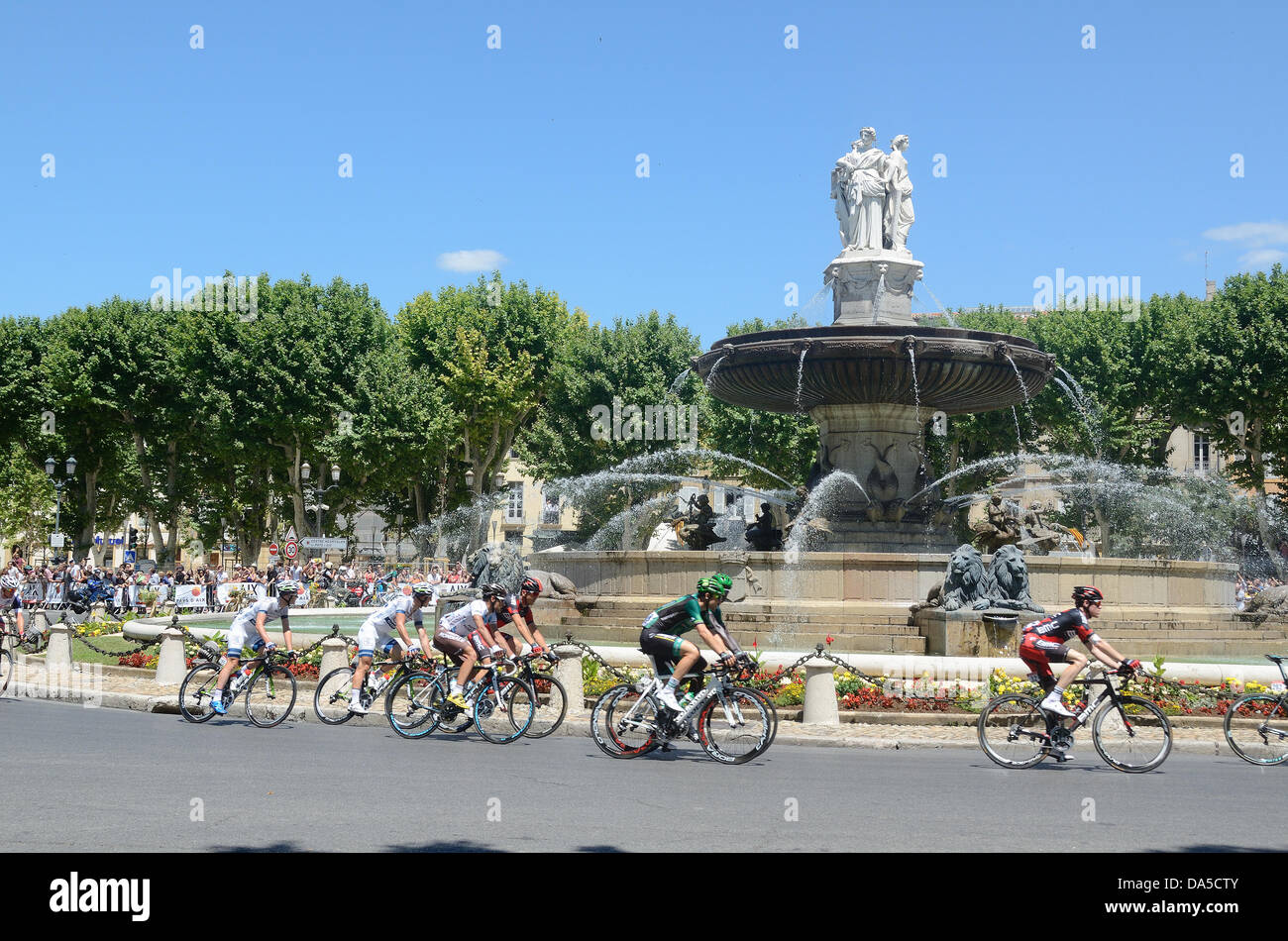 Provence, France. 04th July, 2013. Tour de France Bike Race Cycle Race or Bicycle Race. Cyclists Cycle Past the Rotonde Fountain Aix-en-Provence Credit:  Chris Hellier/Alamy Live News Stock Photo