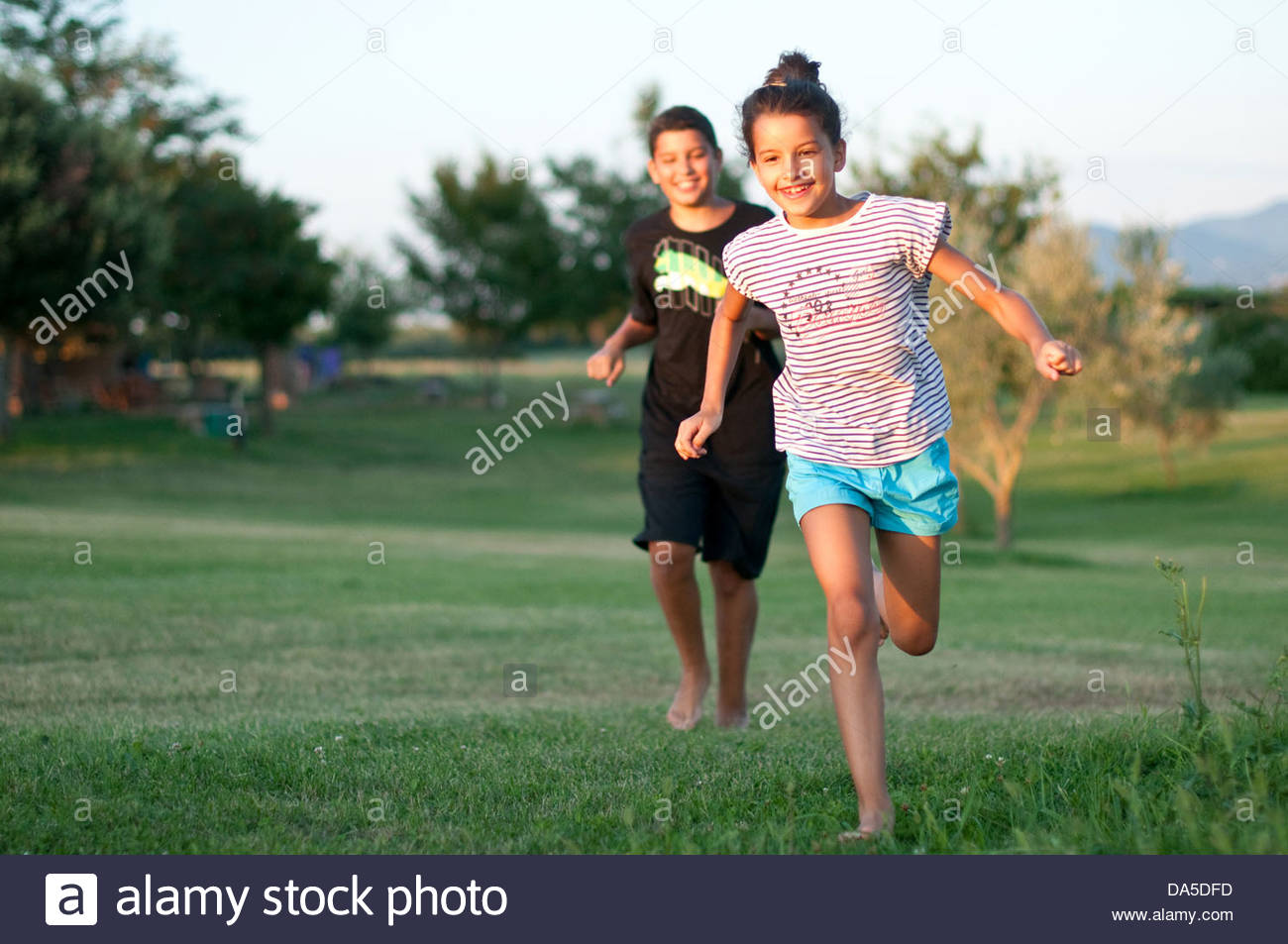 running barefoot on grass