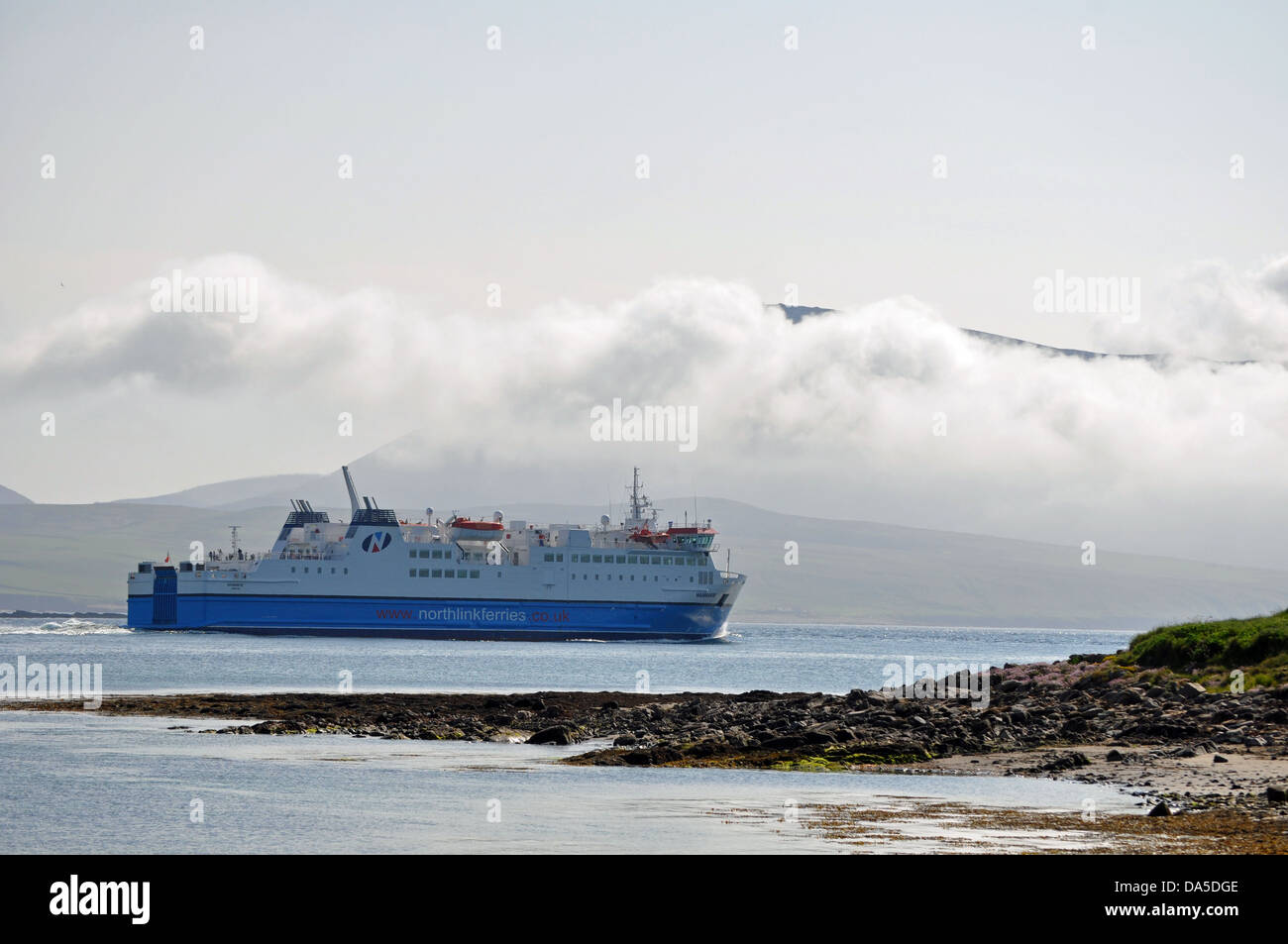 M.V. Hamnavoe - ferry between Scrabster and Stromness in the Orkney Islands passes the island of Hoy Stock Photo