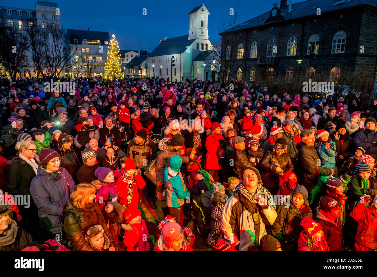 Crowds watching a Christmas celebration at Austurvollur, downtown