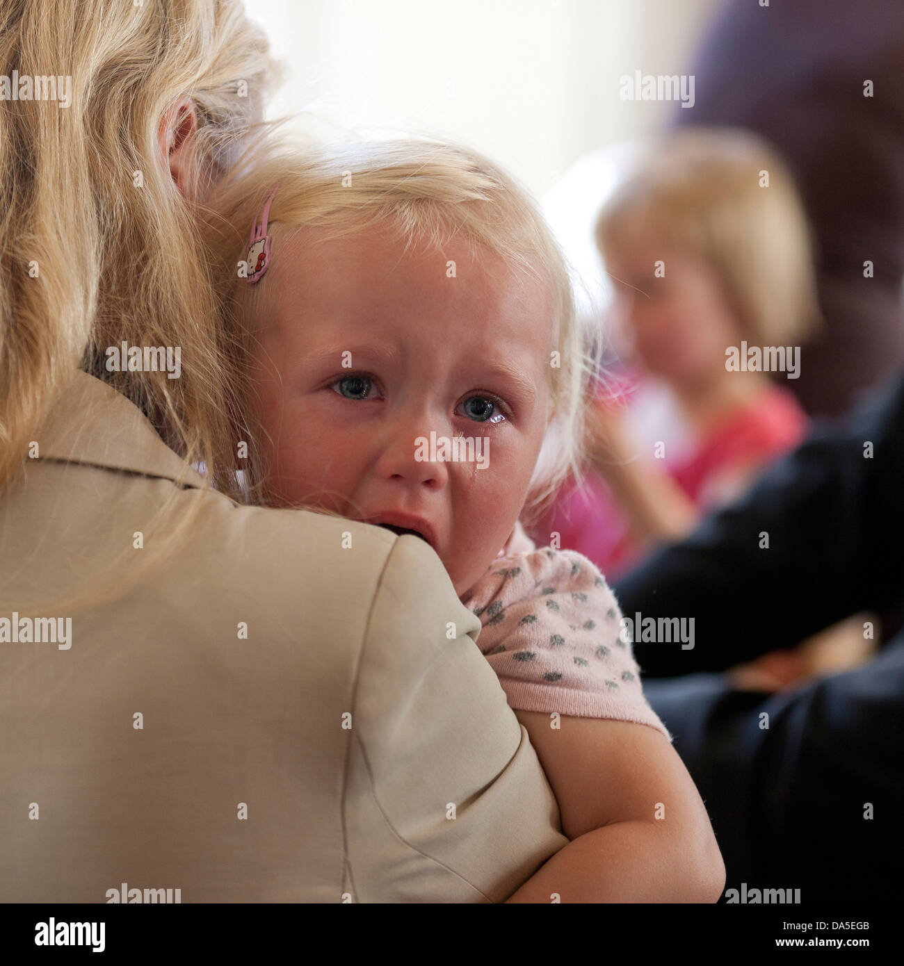 Mother comforting young child Stock Photo