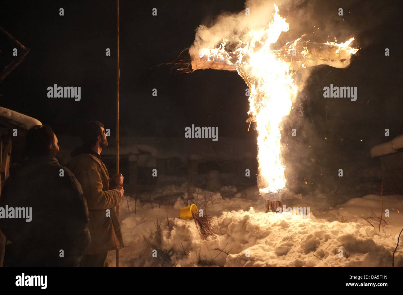 Burning down winter doll during Russian Maslenitsa celebration. Maslenitsa festival separates winter and spring. Stock Photo
