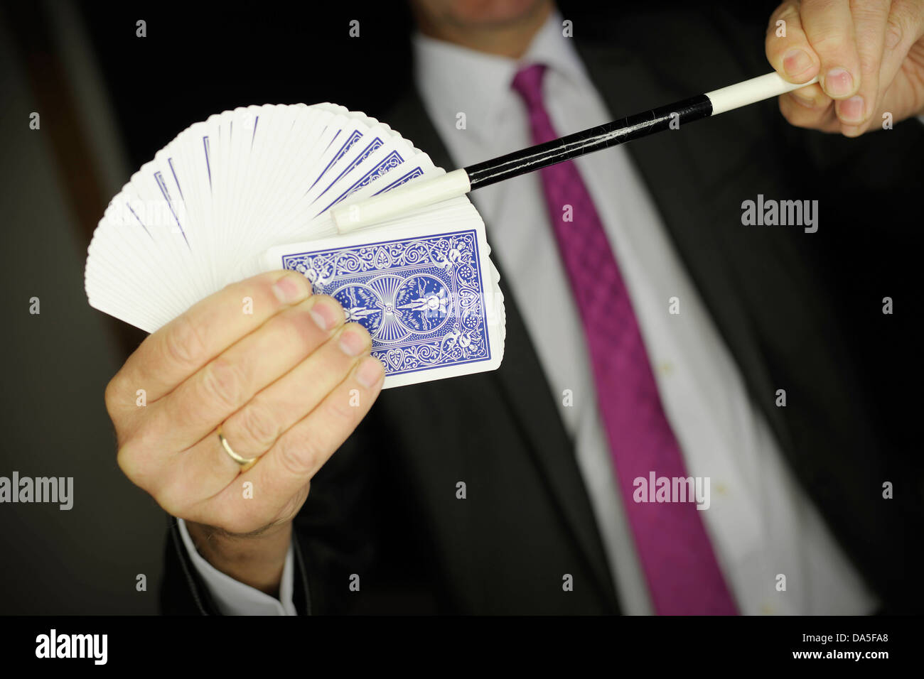 close up shot of magic trick against a black background Stock Photo