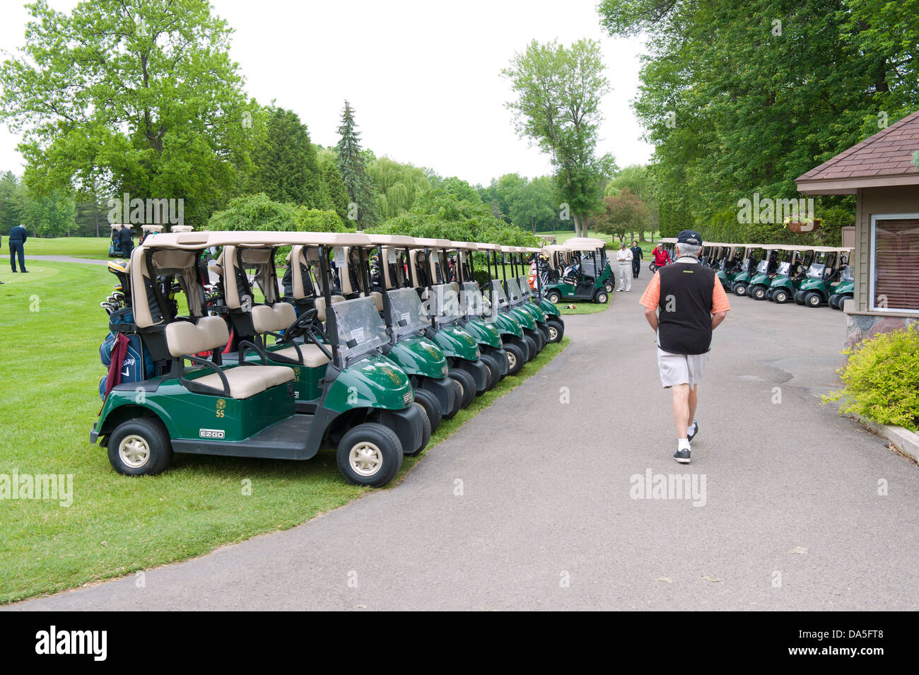 Lined up golf carts before a shotgun start at a corporate golf