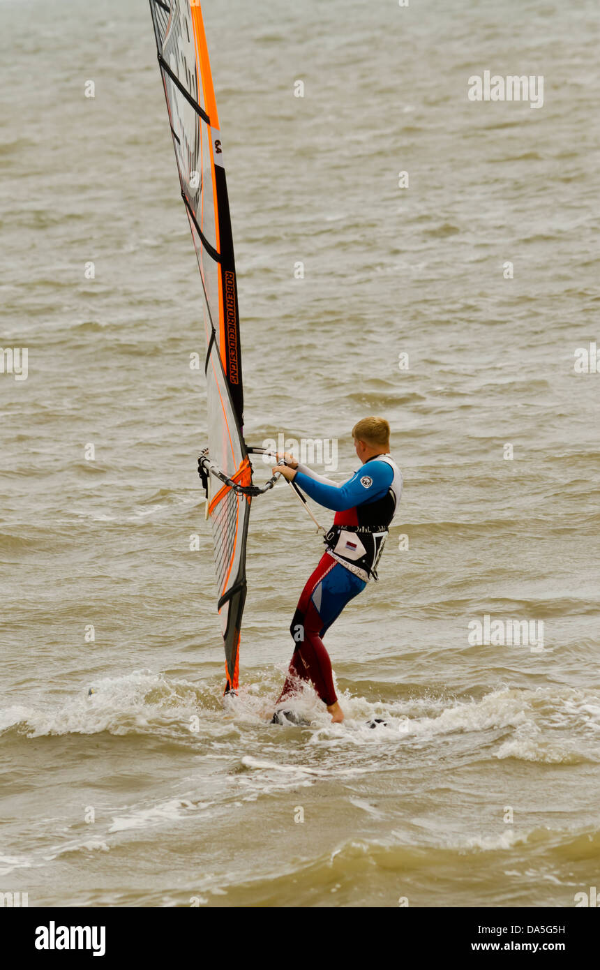 Windsurfing out at sea Stock Photo