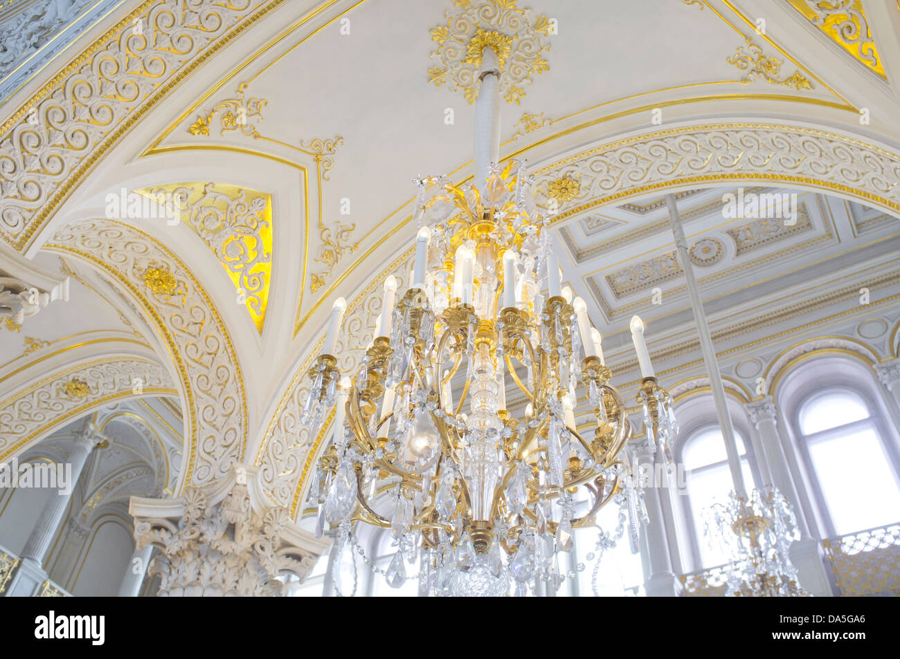 Gold and crystal chandelier in the State Hermitage Museum in St Petersburg. Stock Photo