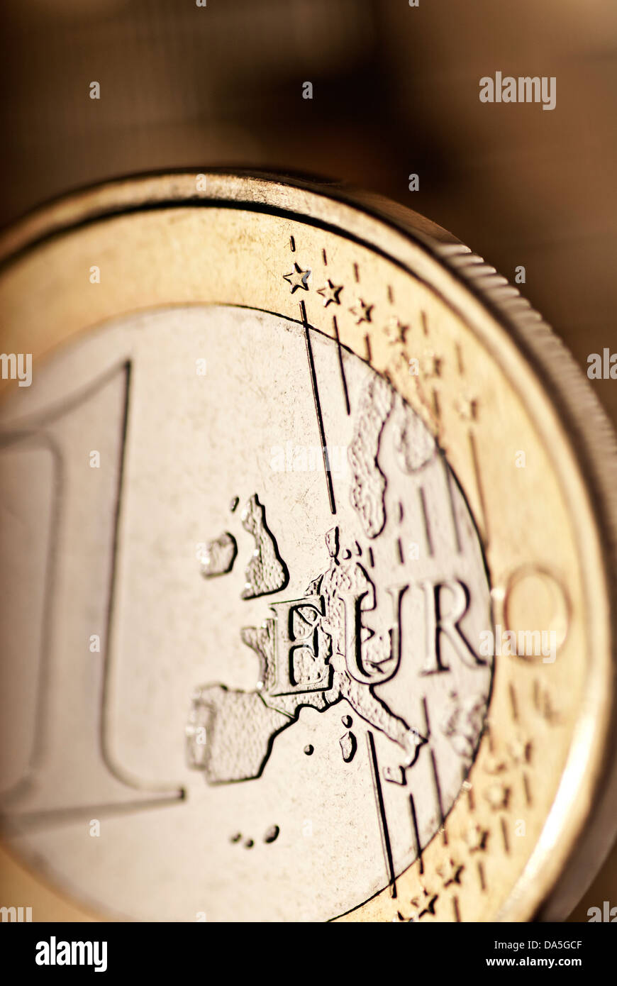 Detail of a One € coin with selective focus. Stock Photo