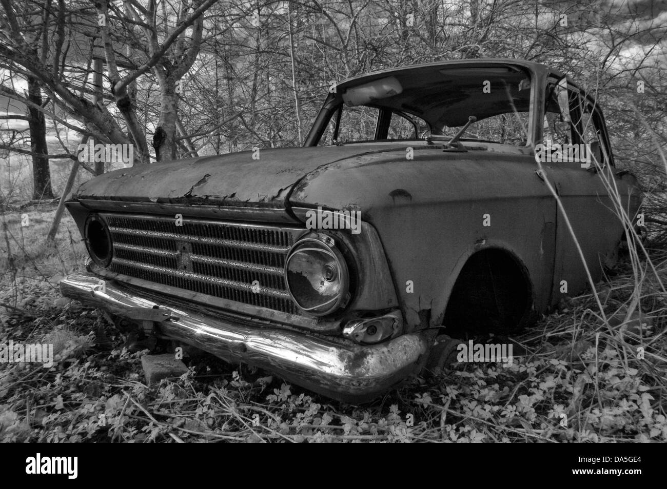 An abandoned Moskvich 412 in black & white. Stock Photo