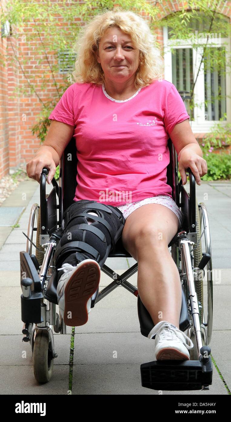 Patient Kerstin Scheller is pictured at the deaconship hospital Annastift in Hanover, Germany, 04 July 2013. A new nerv simulator was implanted into the thigh of her paralysed leg. Photo: Holger Hollemann Stock Photo