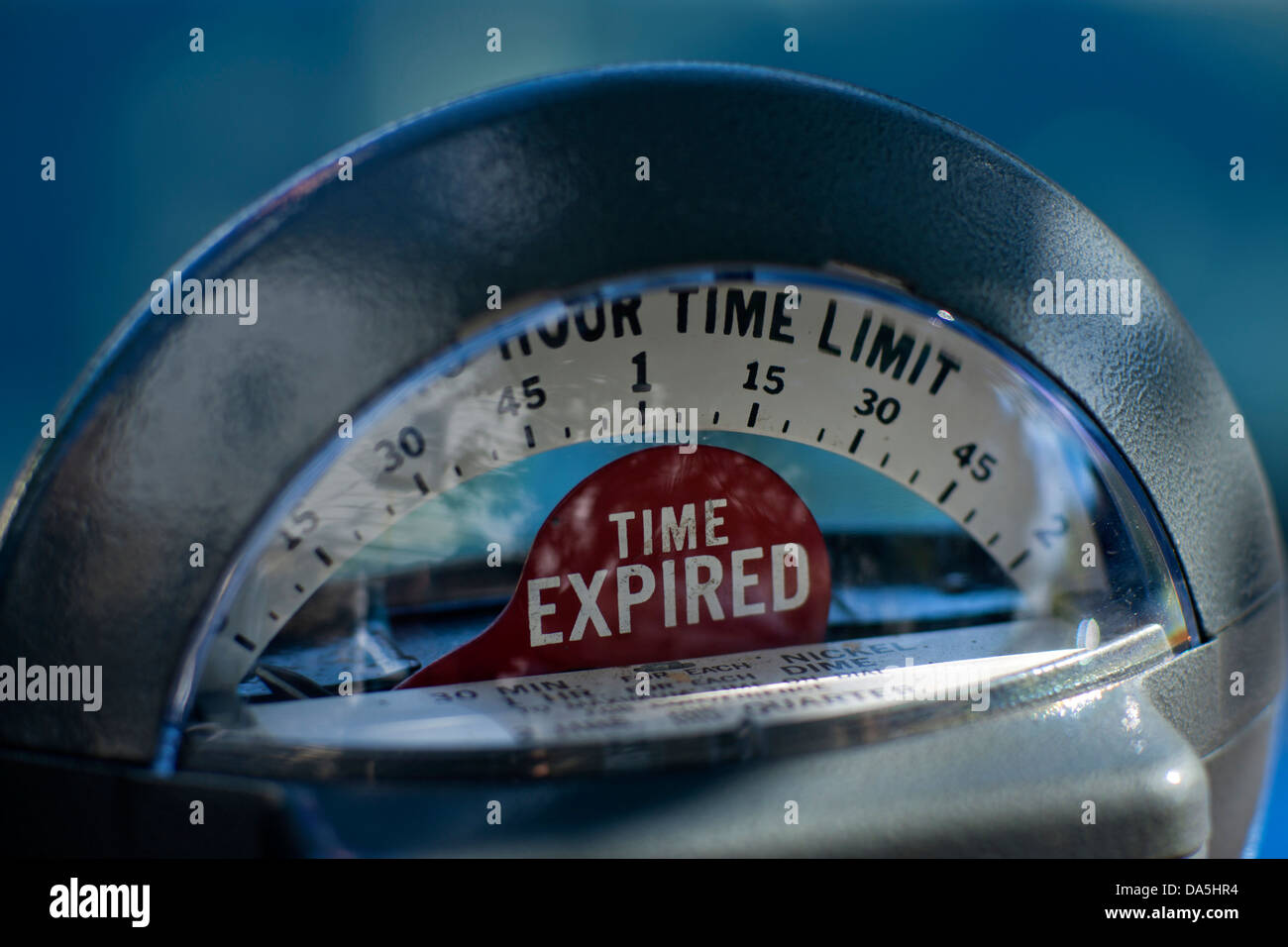 TIME EXPIRED ON ANALOG MECHANICAL PARKING METER Stock Photo