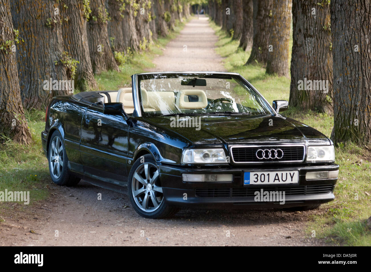 A classical Audi Cabrio parking in an alleyway Stock Photo - Alamy