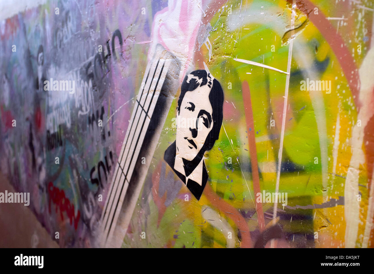 Interior of The Red Stars Hotel. a black and white image of Oscar Wilde on the wall incorporated into a decorative mural. Stock Photo
