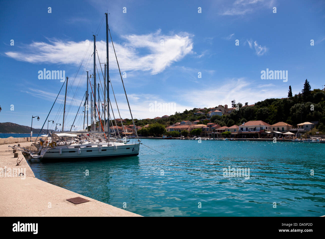 Yachts moored in the harbour at Kalamos, Greece Stock Photo