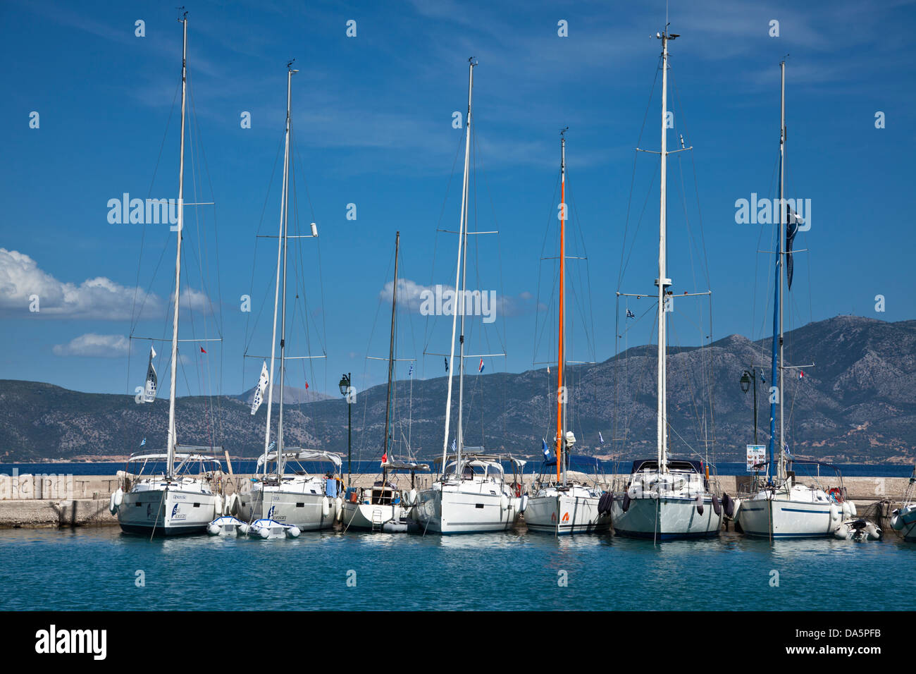 Yachts moored in the harbour at Kalamos, Greece Stock Photo