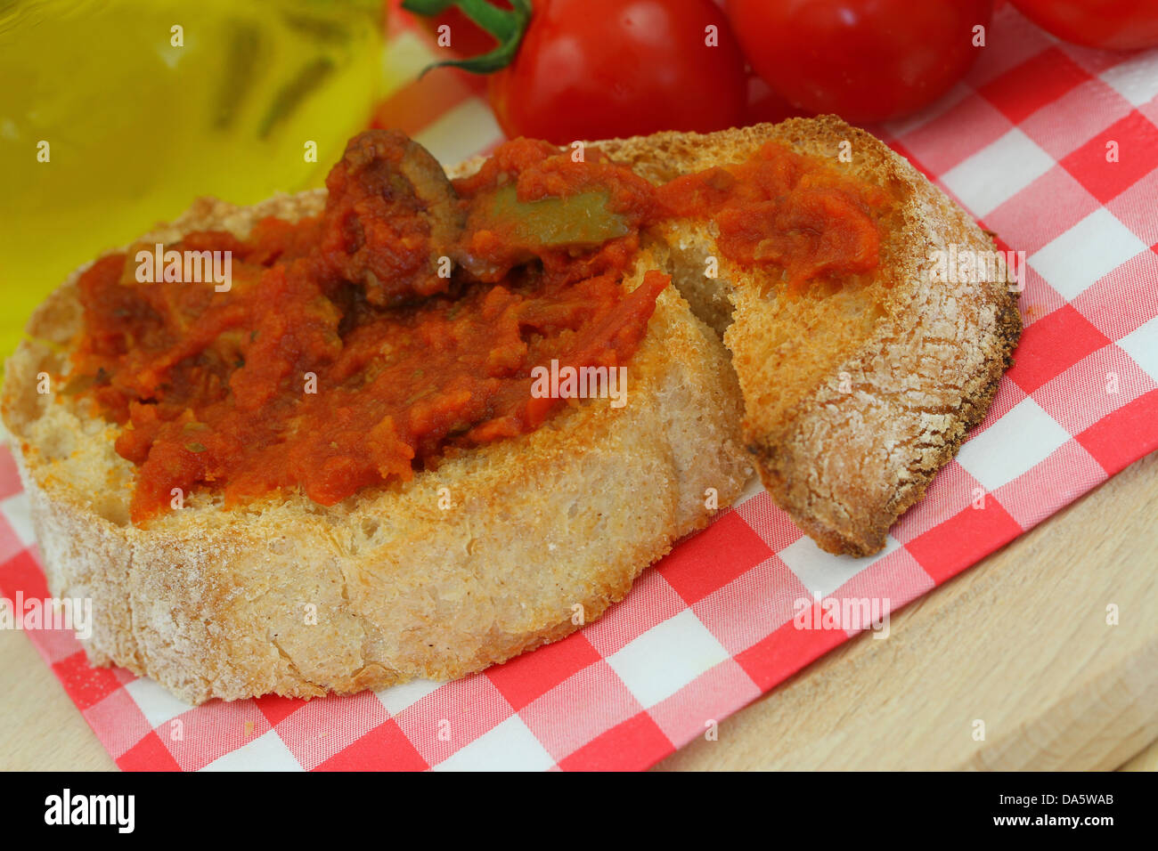 Bruschetta with tomato paste and olives Stock Photo