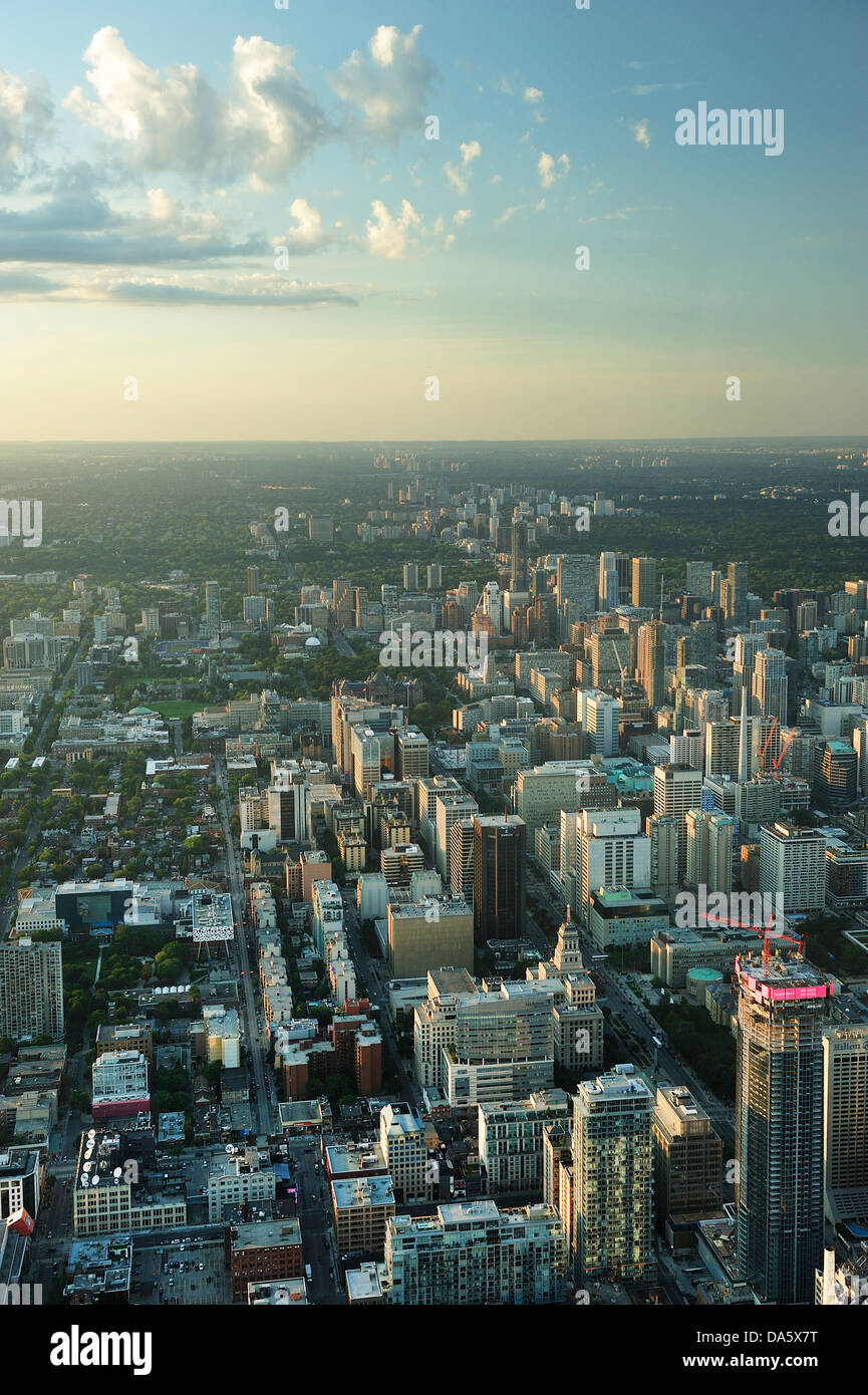 Canada, Clouds, Downtown, from above, Ontario, Toronto, aerial, aerial view, buildings, city, dusk, metropolis, sunset, vertical Stock Photo