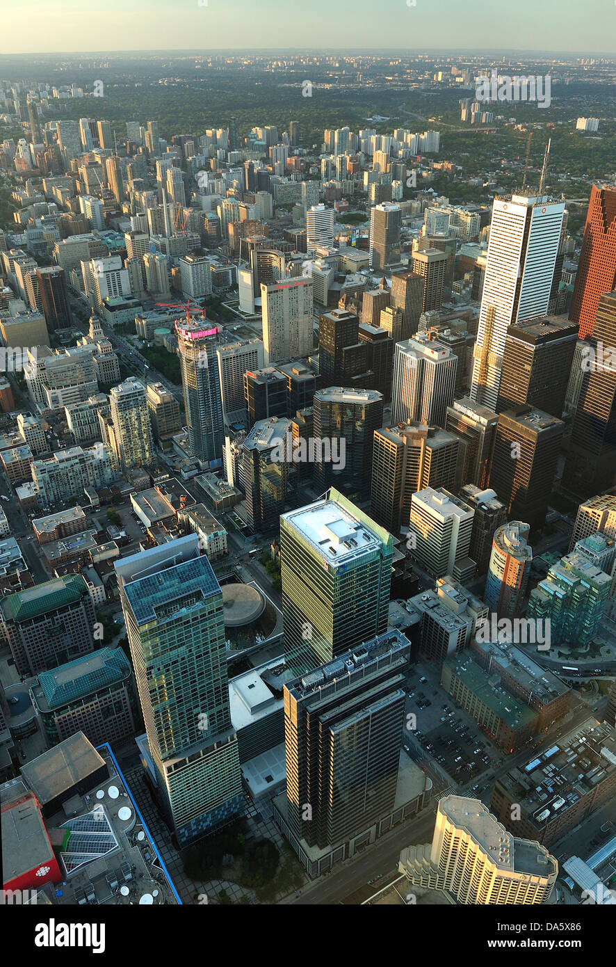 Canada, Clouds, Downtown, from above, Ontario, Toronto, aerial, aerial view, buildings, city, dusk, metropolis, sunset, vertical Stock Photo