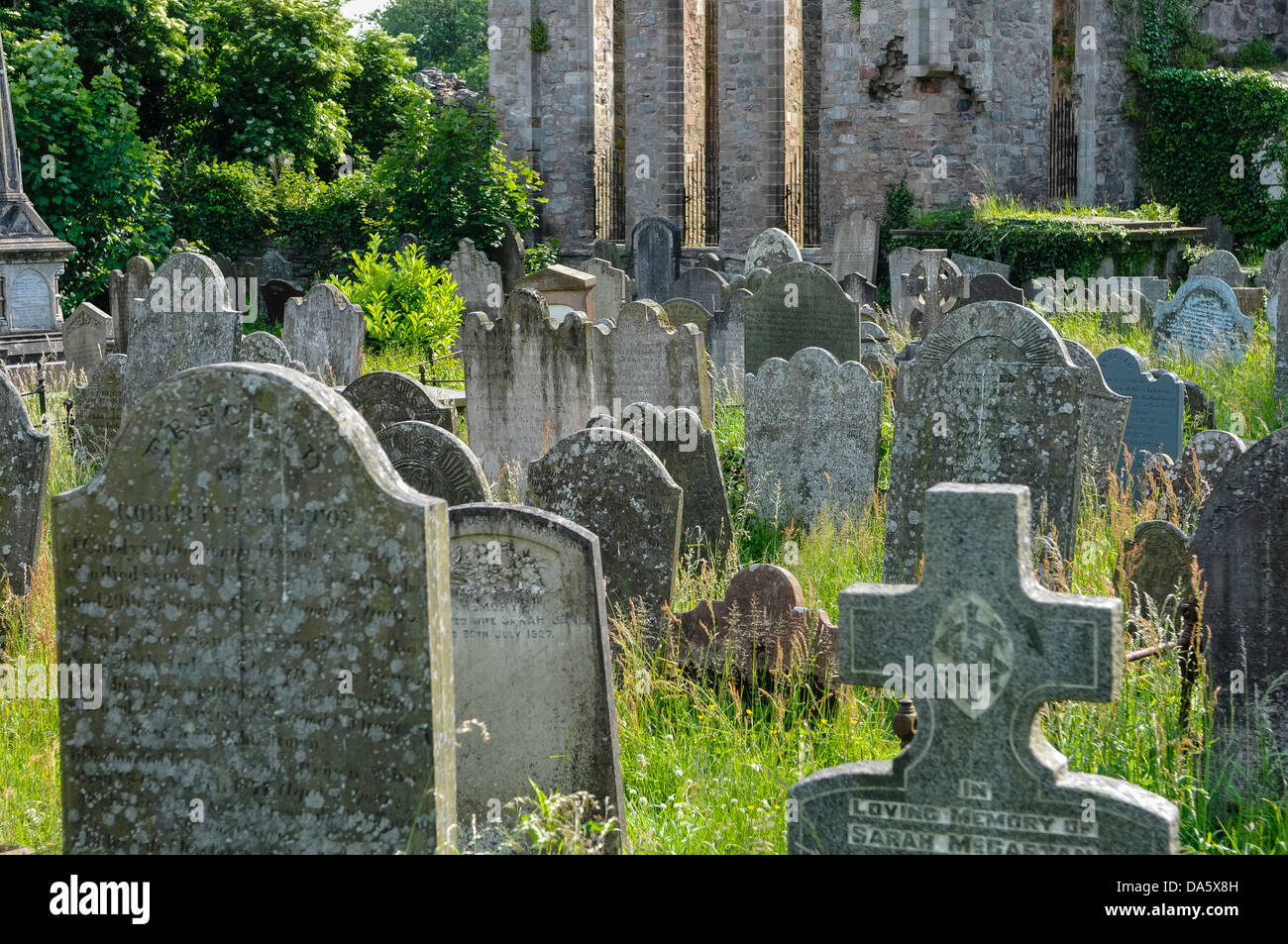Gravestones in a very old graveyard Stock Photo Alamy