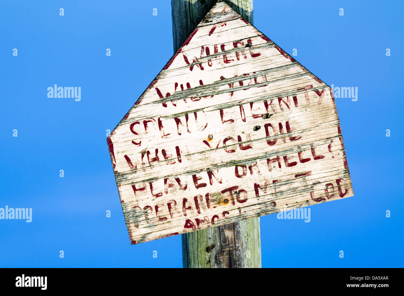 Sign on a lampost with hand-written message typical of many signs found in rural parts of Northern Ireland Stock Photo