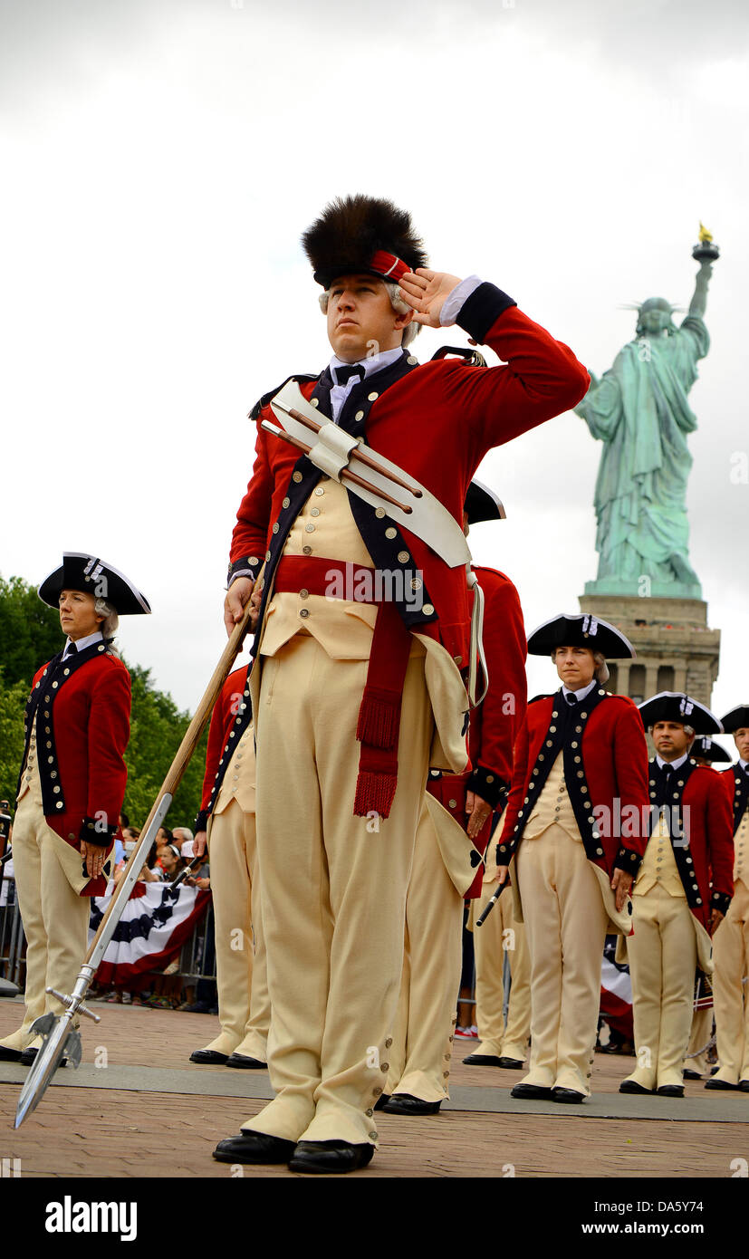 New York, USA. 4th July, 2013. Members from the Old Guard Fife and Drum Corps perform at the re-opening of the Statue of Liberty July 4, 2013 at Liberty Island, NJ. The park was reopened months after super storm Sandy swamped the tiny island. Credit:  Planetpix/Alamy Live News Stock Photo