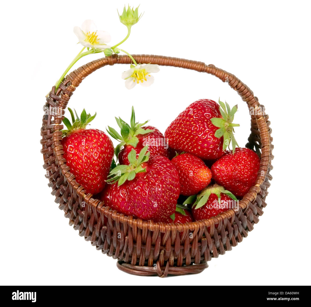 Brown basket with red strawberries filled in, food concept Stock Photo