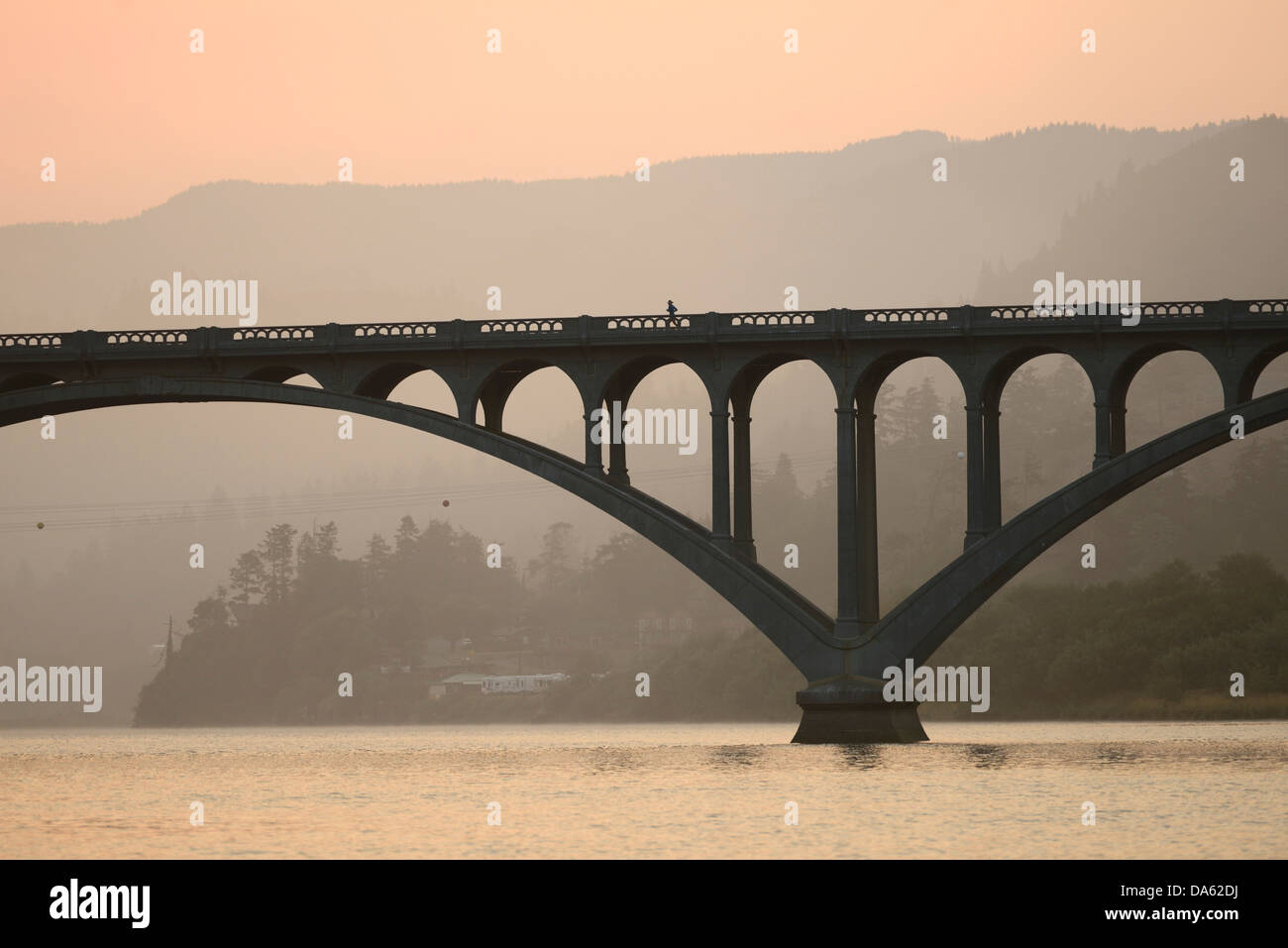 USA, United States, America, North America, Pacific Northwest, Oregon, Coast, Rogue river, river, bridge, morning, sunrise, mist Stock Photo