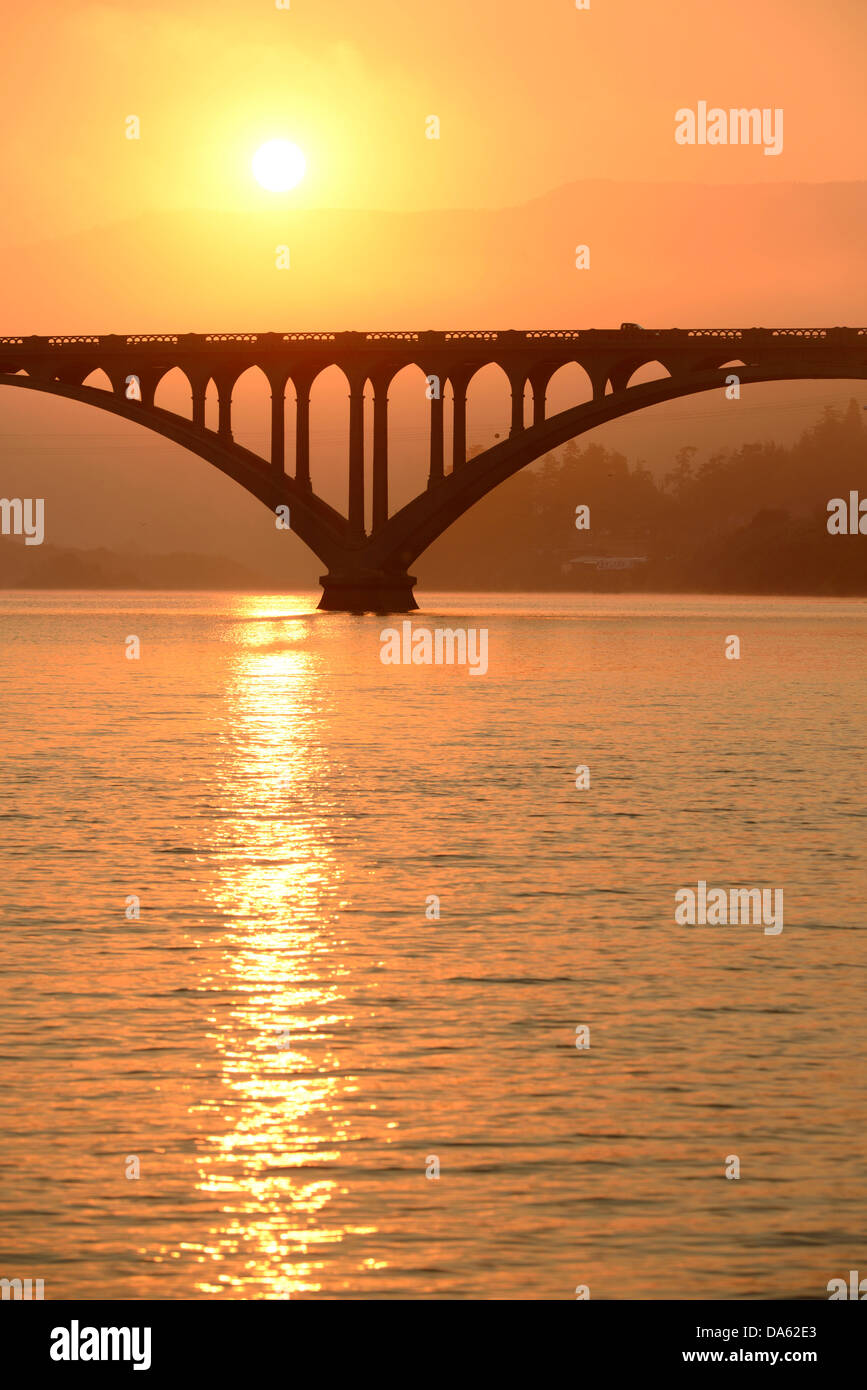 USA, United States, America, North America, Pacific Northwest, Oregon, Coast, Rogue river, river, bridge, morning, sunrise, mist Stock Photo
