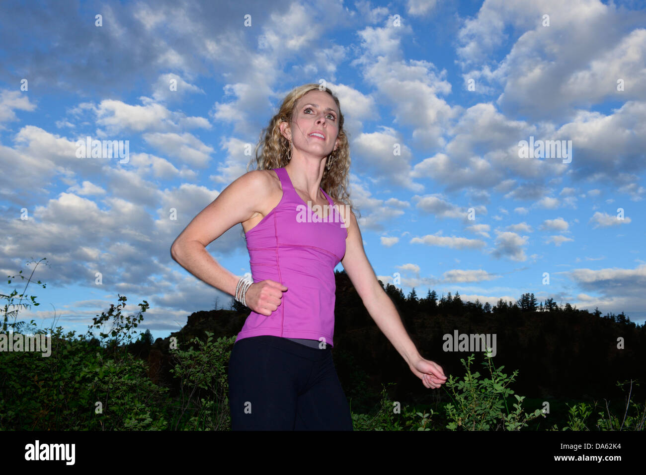 USA, United States, America, North America, Pacific Northwest, Oregon, Deschutes County, running, outdoor, trail, clouds, woman, Stock Photo