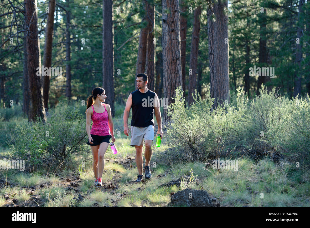 USA, United States, America, North America, Pacific Northwest, Oregon, Deschutes County, running, outdoor, trail, forest, couple Stock Photo
