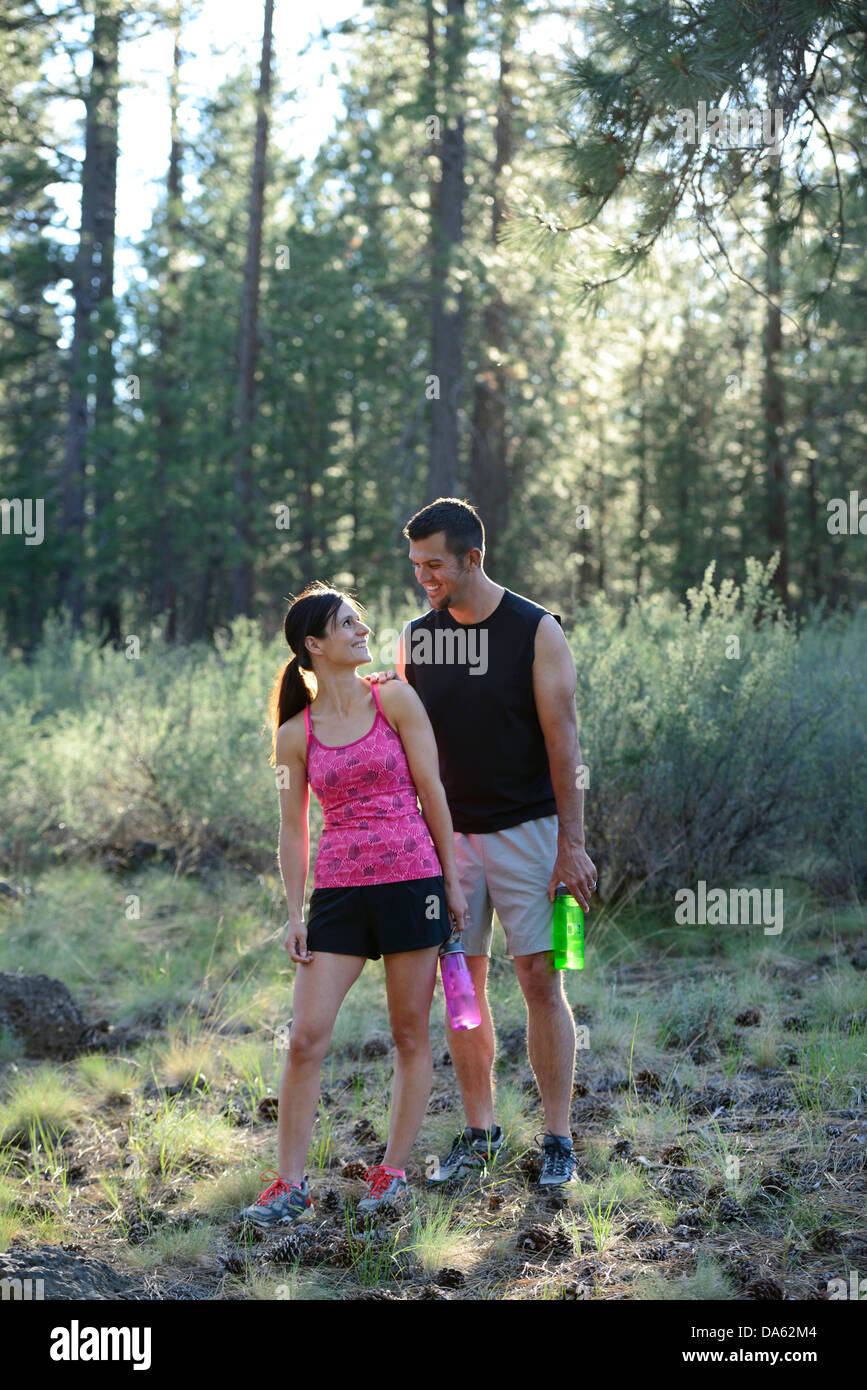 USA, United States, America, North America, Pacific Northwest, Oregon, Deschutes County, running, outdoor, trail, forest, couple Stock Photo