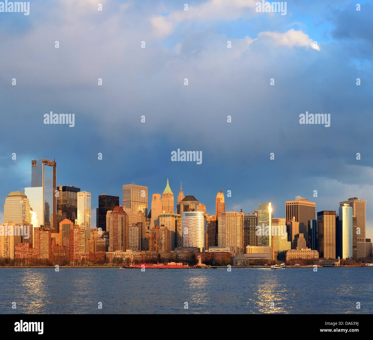 Downtown Manhattan skyline at sunset over Hudson River in New York City ...