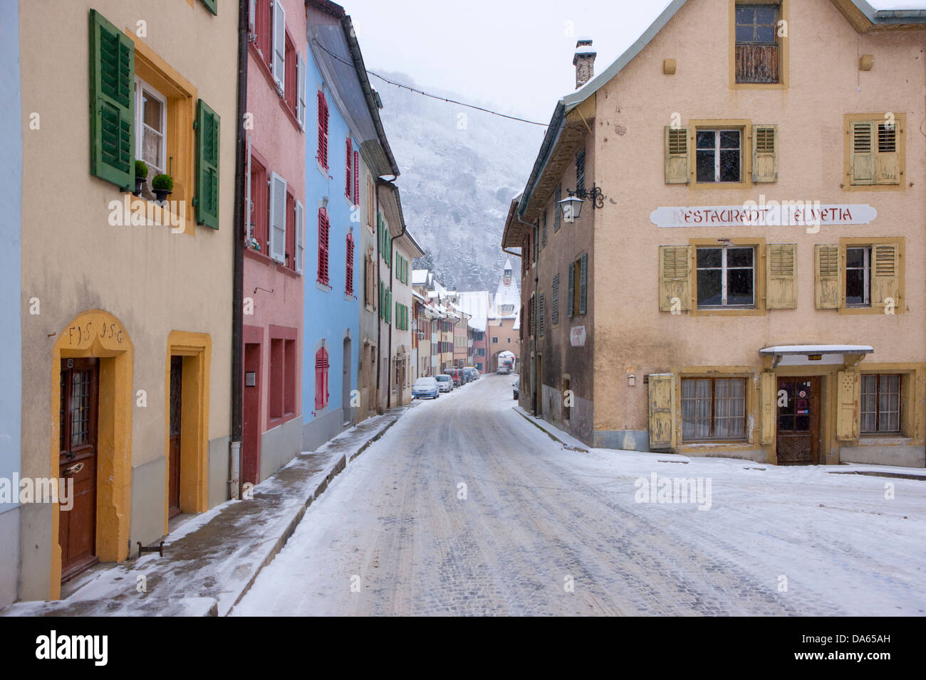 Saint Ursanne, Jura, canton, JU, village, snow, winter, Switzerland, Europe, street Stock Photo