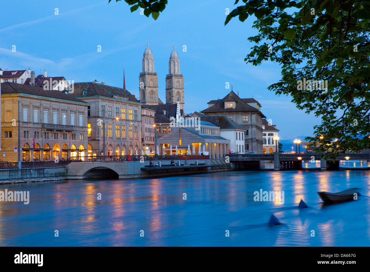 Zurich, Grossmünster, Limmat, river, flow, brook, body of water, water, building, construction, church, religion, night, dark, t Stock Photo