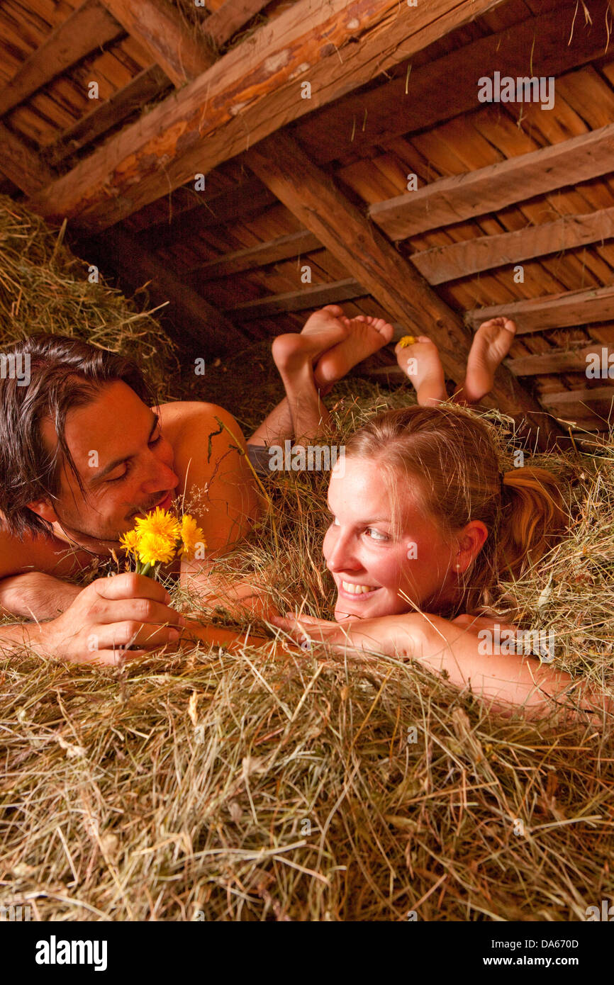 Couple, alpine hut, sleeping, hay, mountain, mountains, canton, Bern, Bernese Oberland, agriculture, holidays, farm, Switzerland Stock Photo