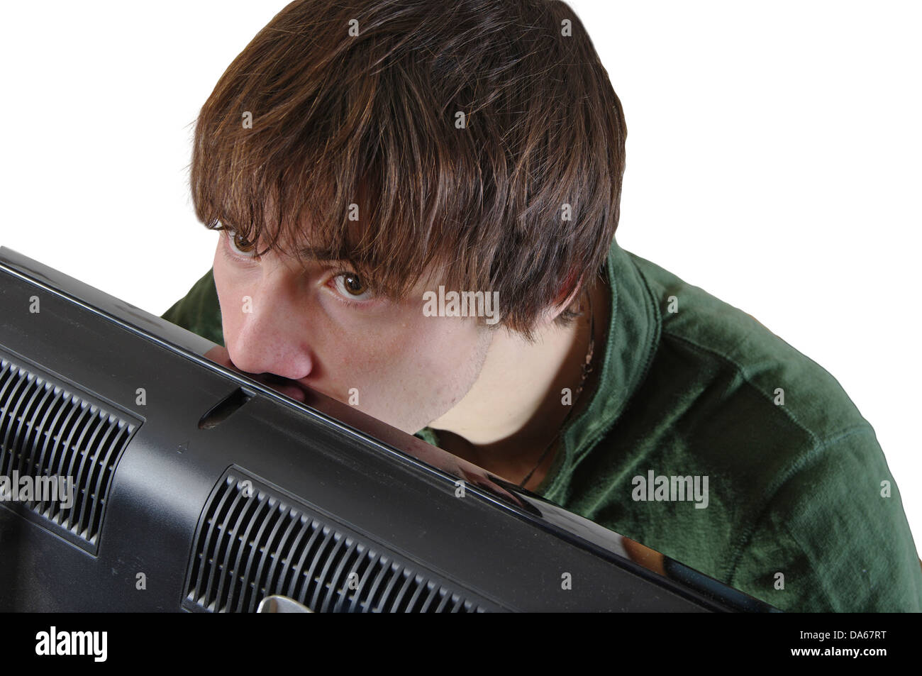 Teen thinks after watching TV Stock Photo
