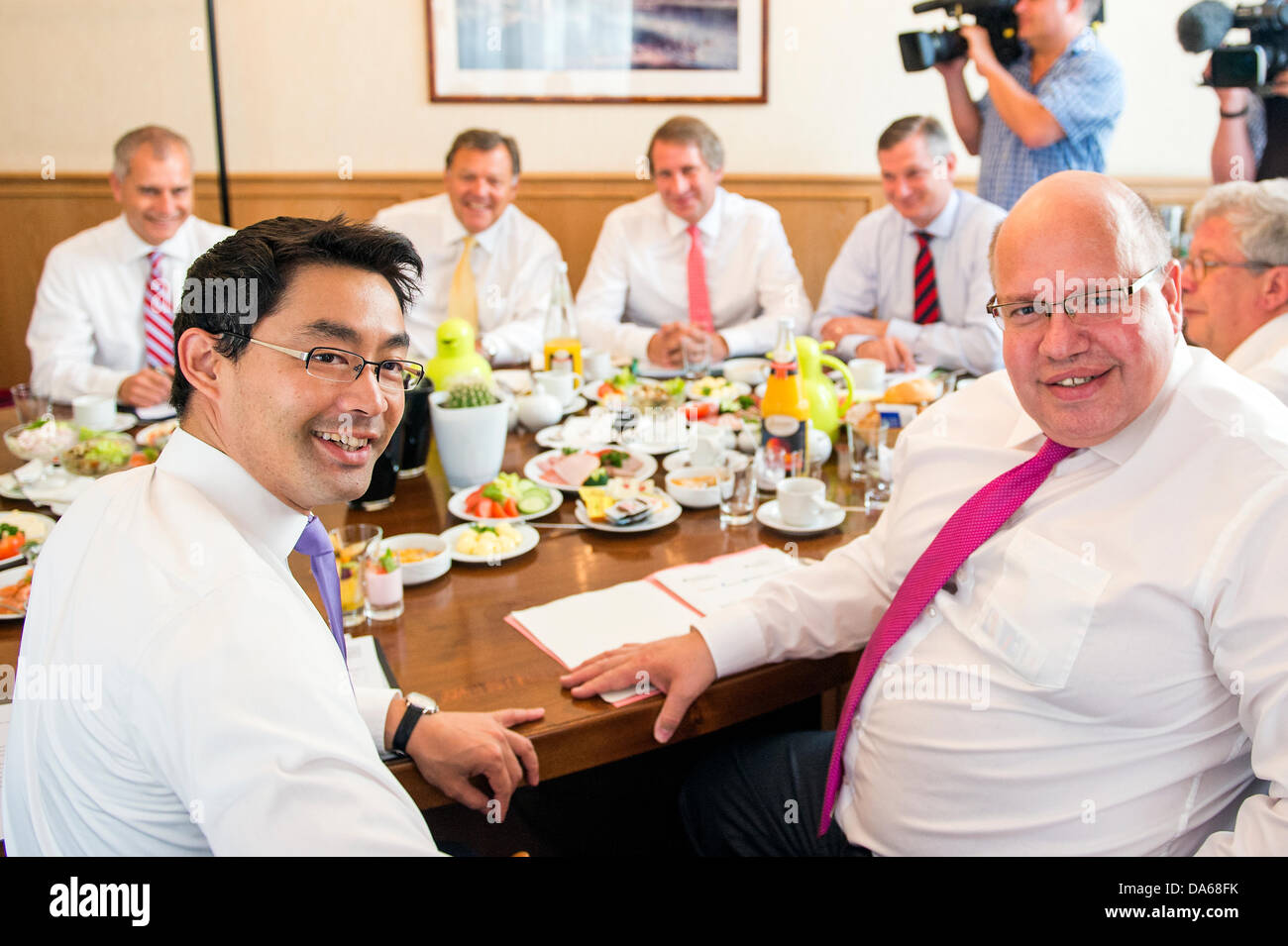 Berlin, Germany. July 5th 2013. Inter alia press conference with German Minister Philipp Rösler and Minister Peter Altmaier about concept of citizen participation in network expansion with agreement signing between the companies and the Government. Credit: Credit:  Gonçalo Silva/Alamy Live News. Stock Photo
