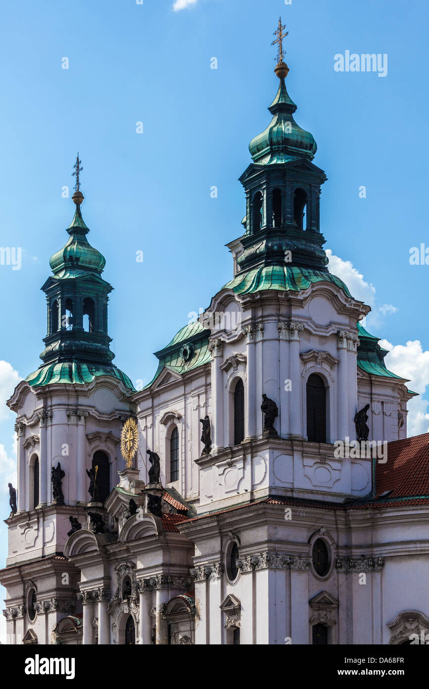 The Baroque facade and steeples of St Nicholas Church in the Old Town Square, Prague Stock Photo