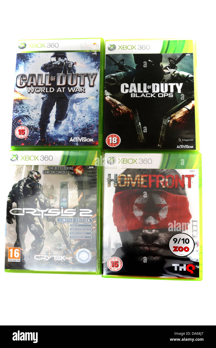 4 XBOX 360 Games Call Of Duty World At War, Crysis 2, Call Of Duty Black Ops And Homefront Stock Photo