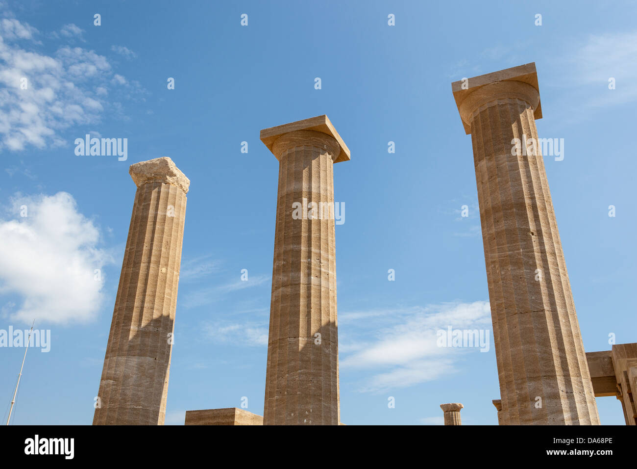 Columns of the Doric Temple of Athena Lindia, the Acropolis, Lindos, Rhodes, Greece Stock Photo