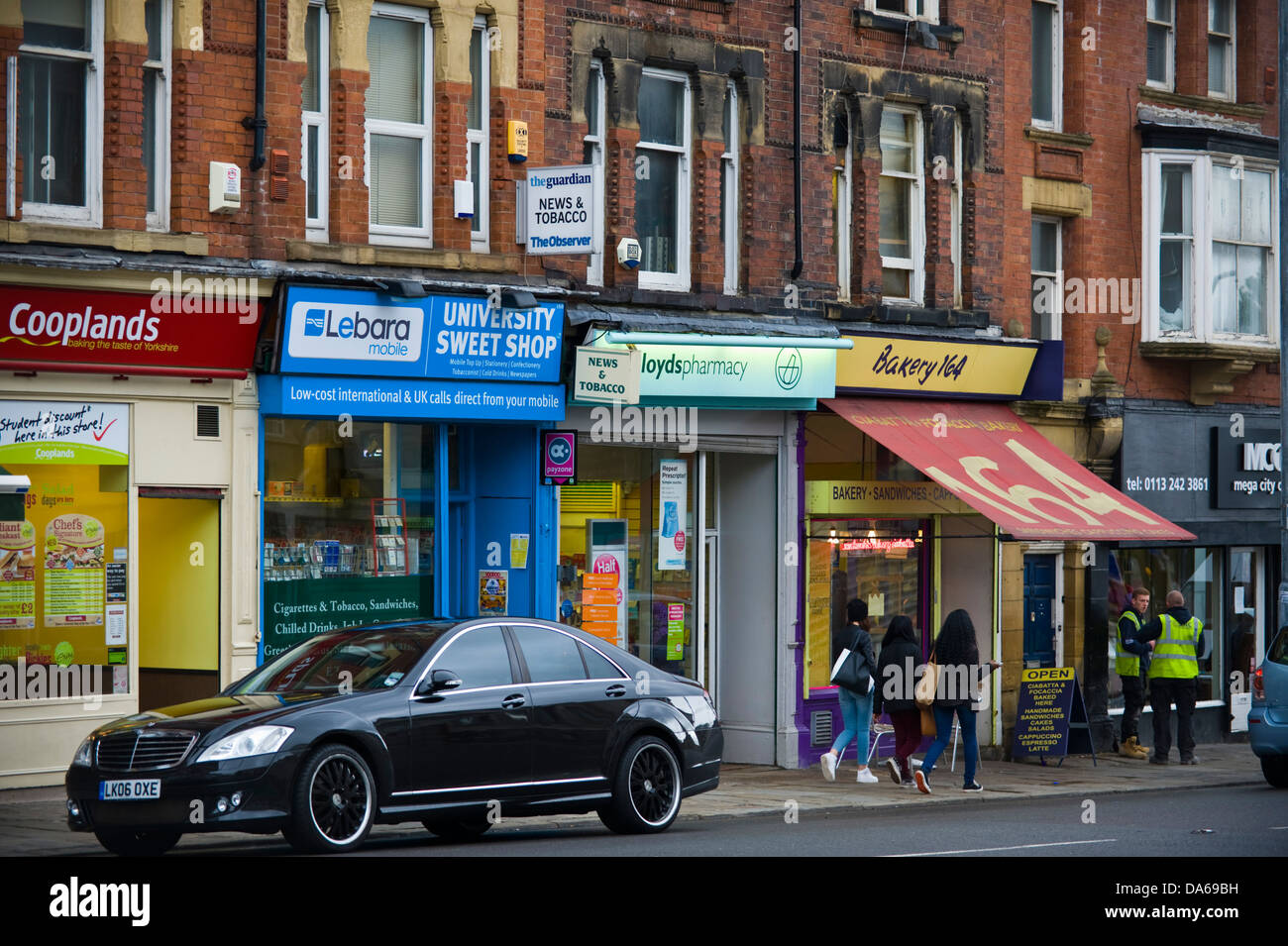 Row of local shops in Leeds West Yorkshire England UK Stock Photo Alamy