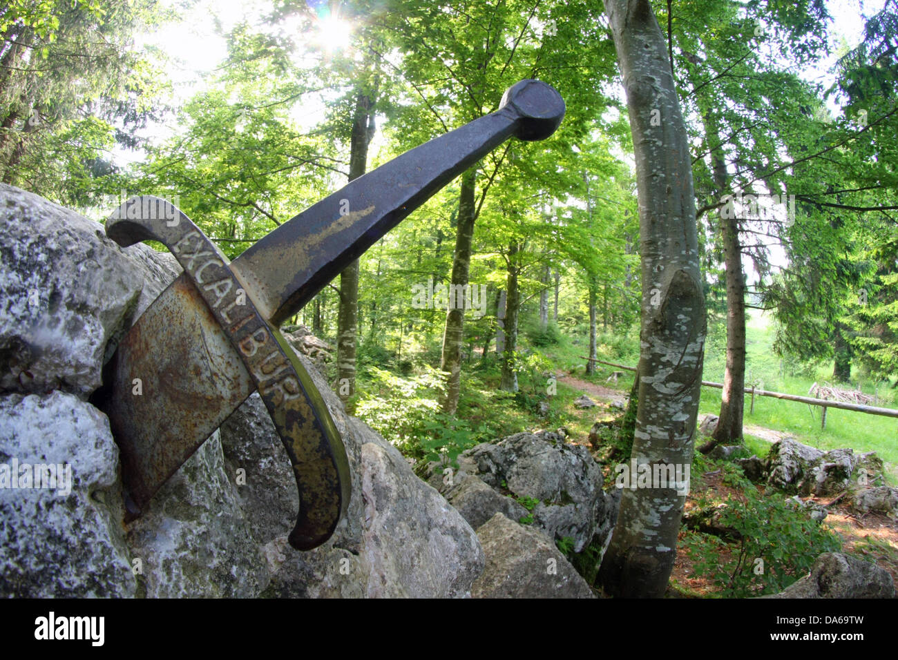 legendary and famous sword Excalibur to King stuck between the rock Stock Photo