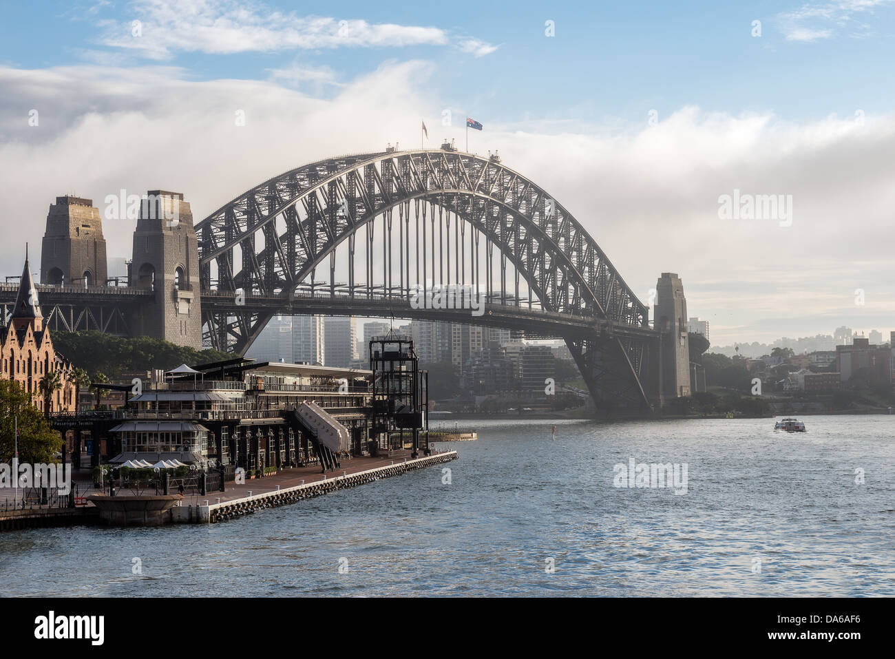 The iconic Sydney Harbour Bridge which spans from downtown to North Sydney . Stock Photo