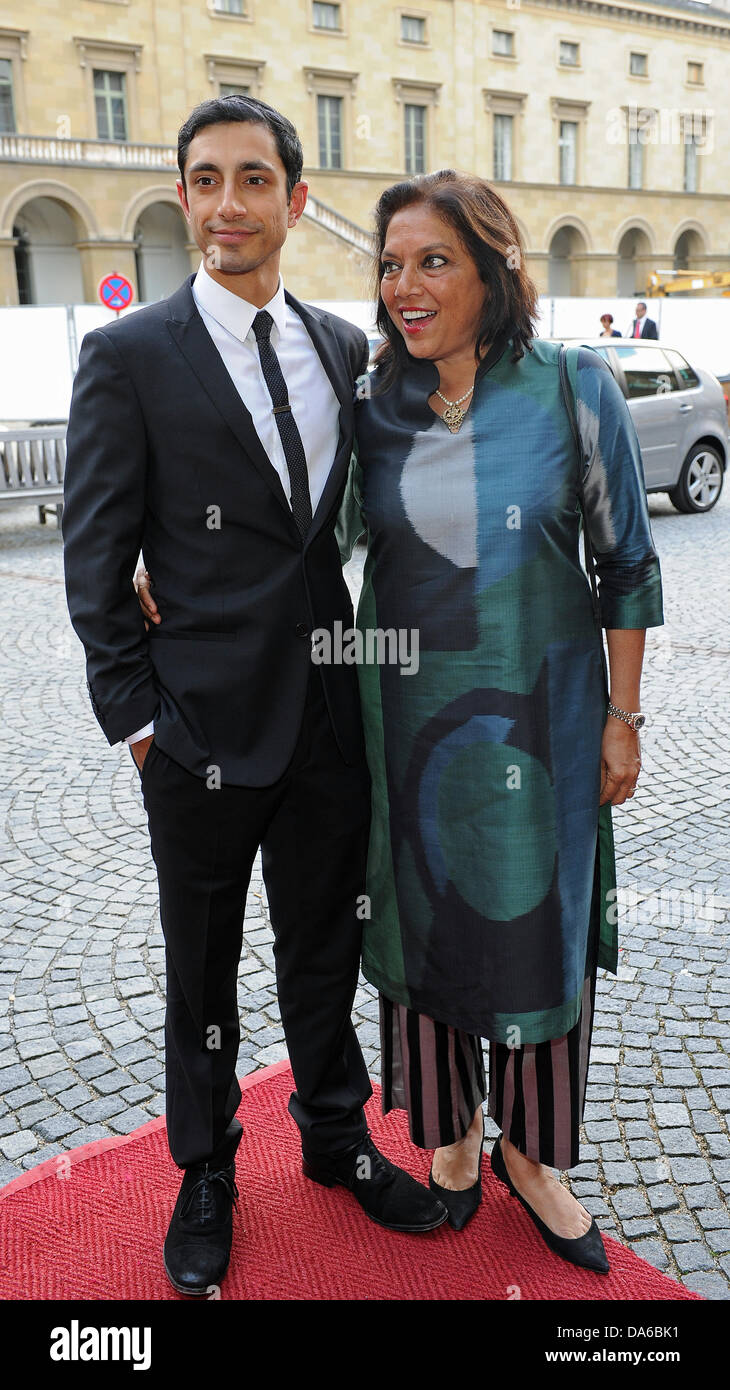 Indian filmmaker Mira Nair and British actor Riz Ahmed arrives to the ceremony for the 'Bernhard Wicki Film Prize - The Bridge - German Cinema Award for Peace 2013' at the Cuvillies Theater in Munich, Germany, 04 July 2013. Photo: URSULA DUEREN Stock Photo