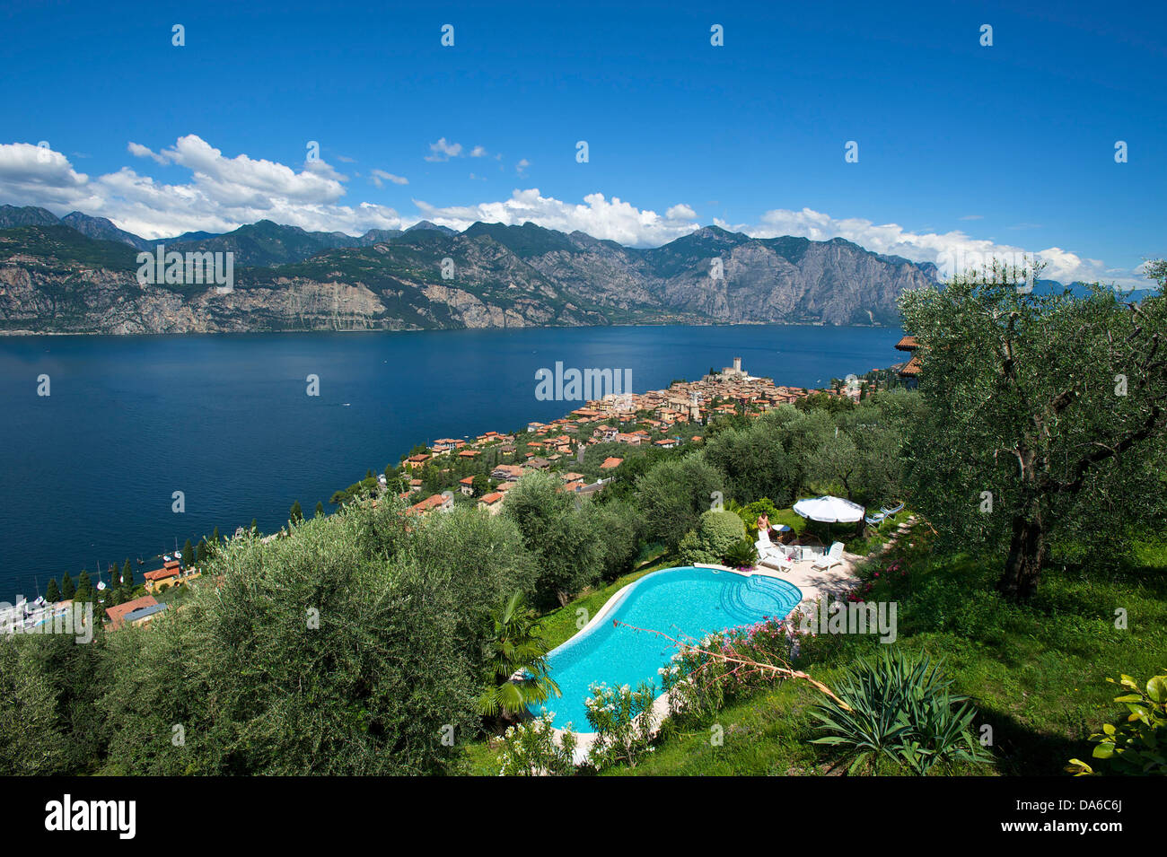 Lake Garda, Italy, Europe, Lago di Garda, Malcesine, town view, hotel pool, pool arrangement, pool, hotel, tourism, Swimming poo Stock Photo