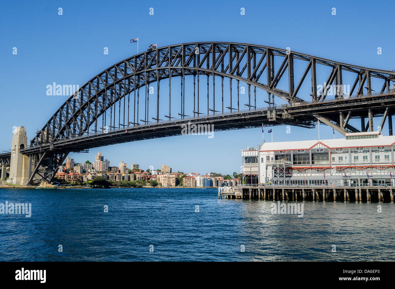 The iconic Sydney Harbour Bridge which spans from downtown to North Sydney . Stock Photo