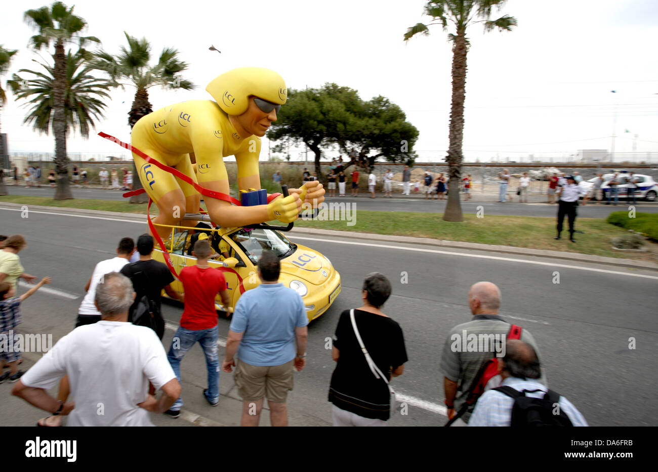 Official car with giant cyclist during the Tour de France cycle race in