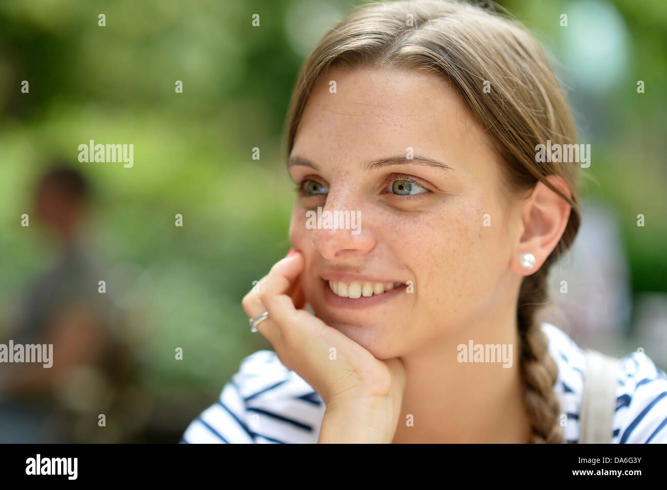 Young woman freckles leaning hi-res stock photography and images - Alamy