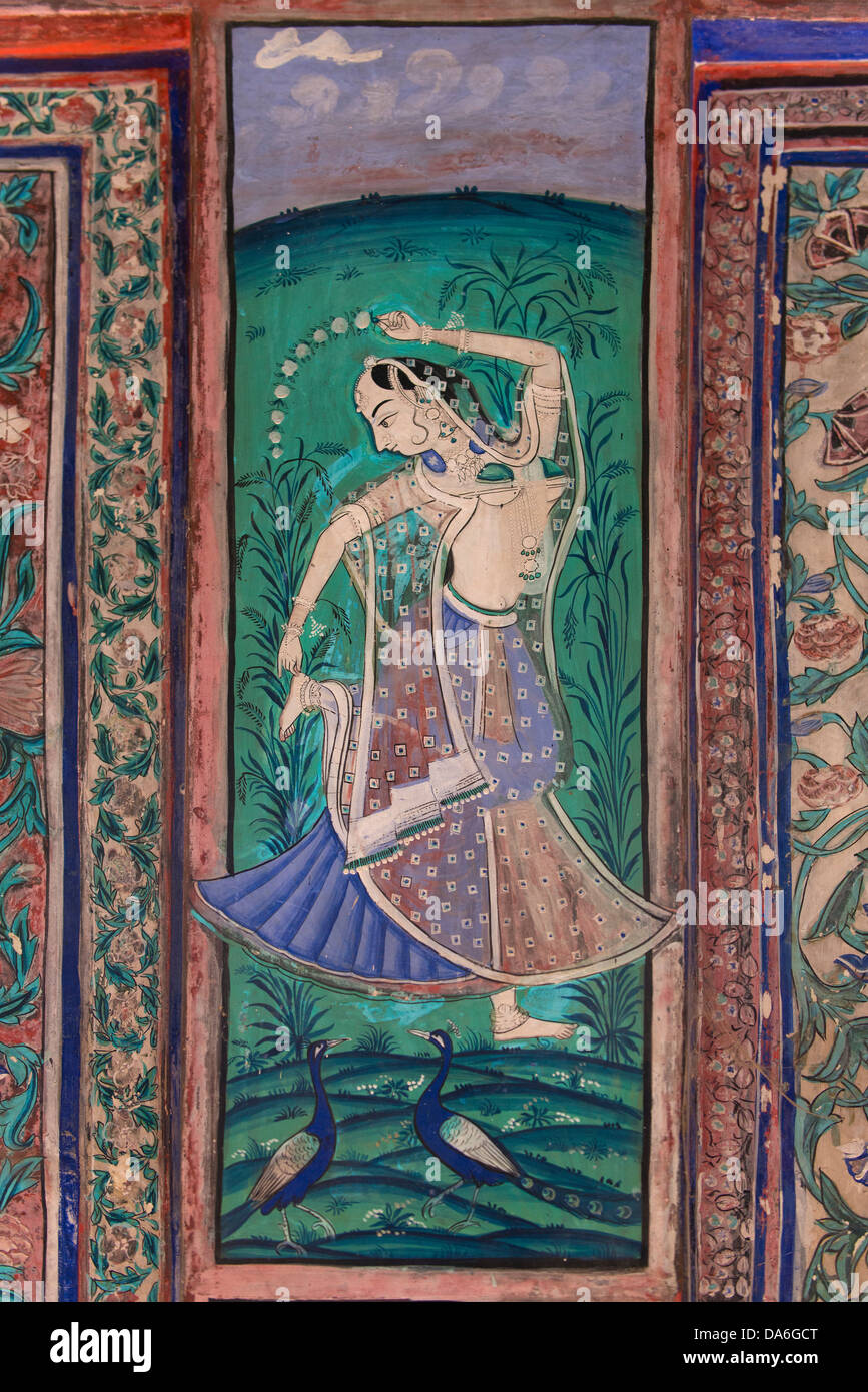 Dancing woman with two peacocks, wall painting or fresco painted with natural colours from the Bundikalam school of painting, Stock Photo