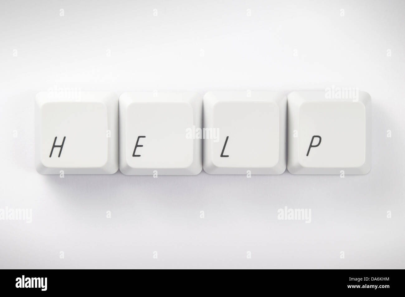 Computer Keys Spelling the Word 'Help' (keys have clipping path) Stock Photo